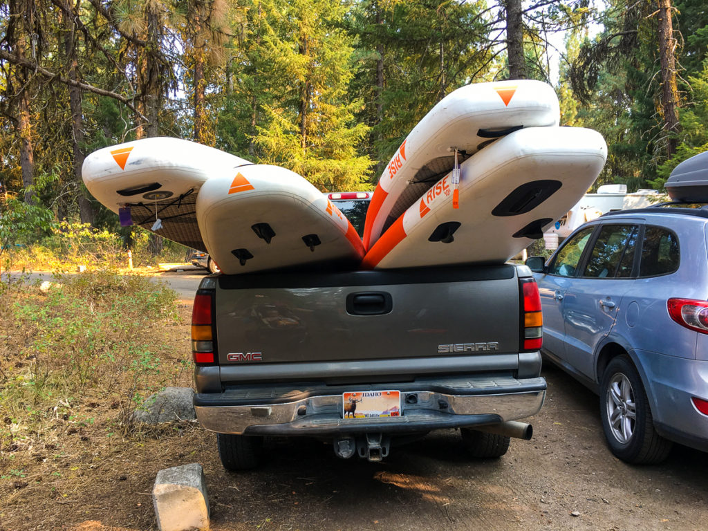Inflatable Stand Up Paddle Boards loaded into the back of a GMC Sierra Pickup Truck in Idaho's Ponderosa State Park near McCall Idaho. 
